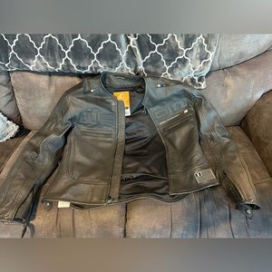 Never worn leather motorcycle insert jacket. Too small
